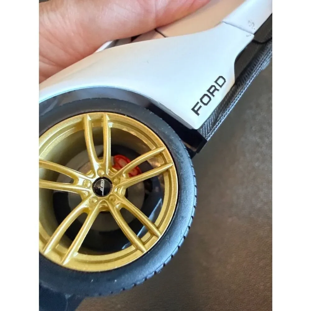 Ford GT # 98 White Heritage Edition Toy Car in White, Black, Red & Gold Maisto